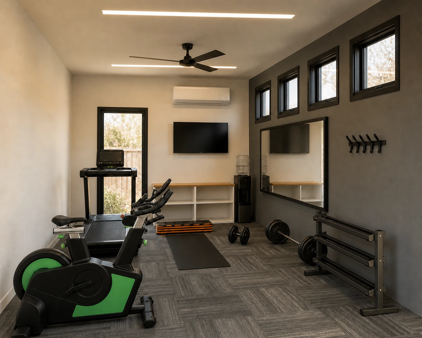 Interior of the 12 by 16 foot Fitness Studio with cardio and strength equipment